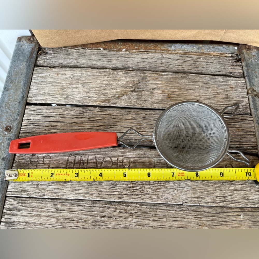 Vintage/antique Tea strainer/ red handled kitchen strainer